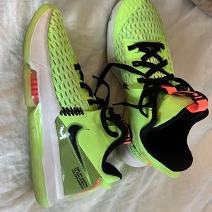 Nike men’s size 9 basketball shoes.  Worn lightly for one season.